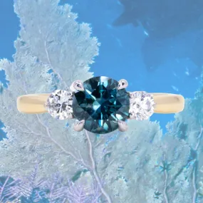 1.57ct Ocean Blue Round Montana Sapphire and Lab Diamond Three Stone Ring in Two Tone Gold