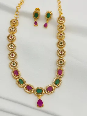 Dazzling Gold Plated Short Necklace And Studded Earrings With Multi Colored Stones